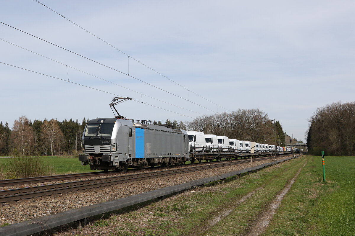 193 991 mit  Kleintransportern  am 26. März 2024 bei Brannenburg.