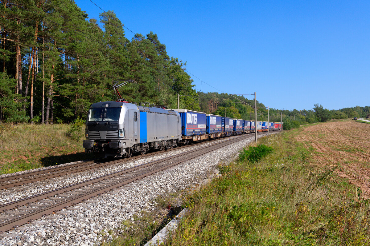 193 995 Railpool/TXL mit dem Routier KLV-Zug bei Hagenbüchach Richtung Würzburg, 19.09.2020