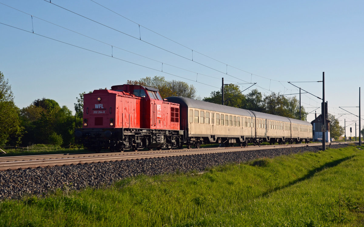 202 264 der WFL schleppte am Morgen des 05.05.18 drei Silberlinge durch Braschwitz Richtung Halle(S).