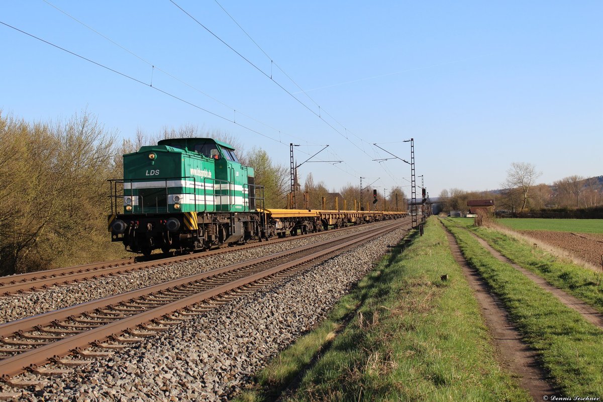 203 127-6 LDS mit leeren Schwellenwagen bei Thüngersheim am 06.04.2018
