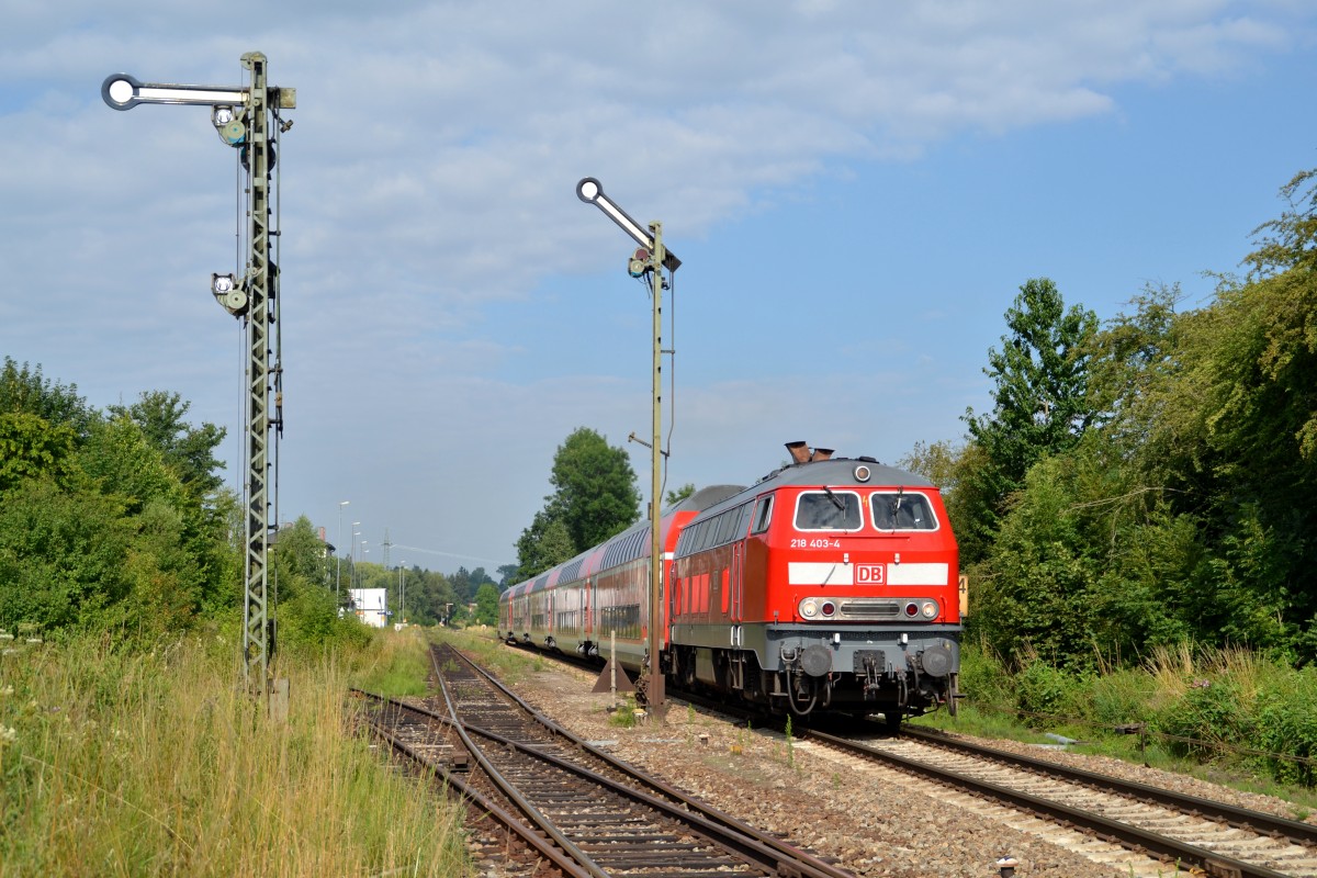 218 403 mit RB 27031 München Hbf - Mühldorf(Oberbay) am 16.07.2014 in Schwindegg.