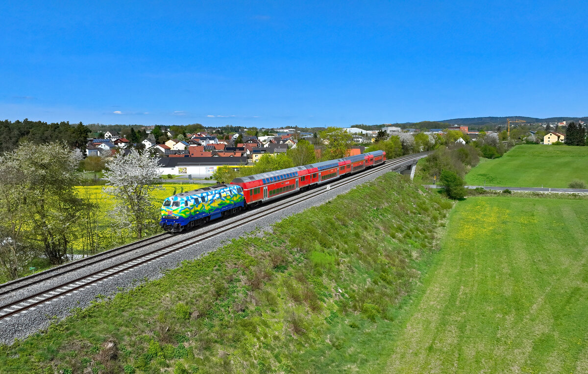 218 443 mit einem RE2 am 11.04.2024 bei Ponholz.