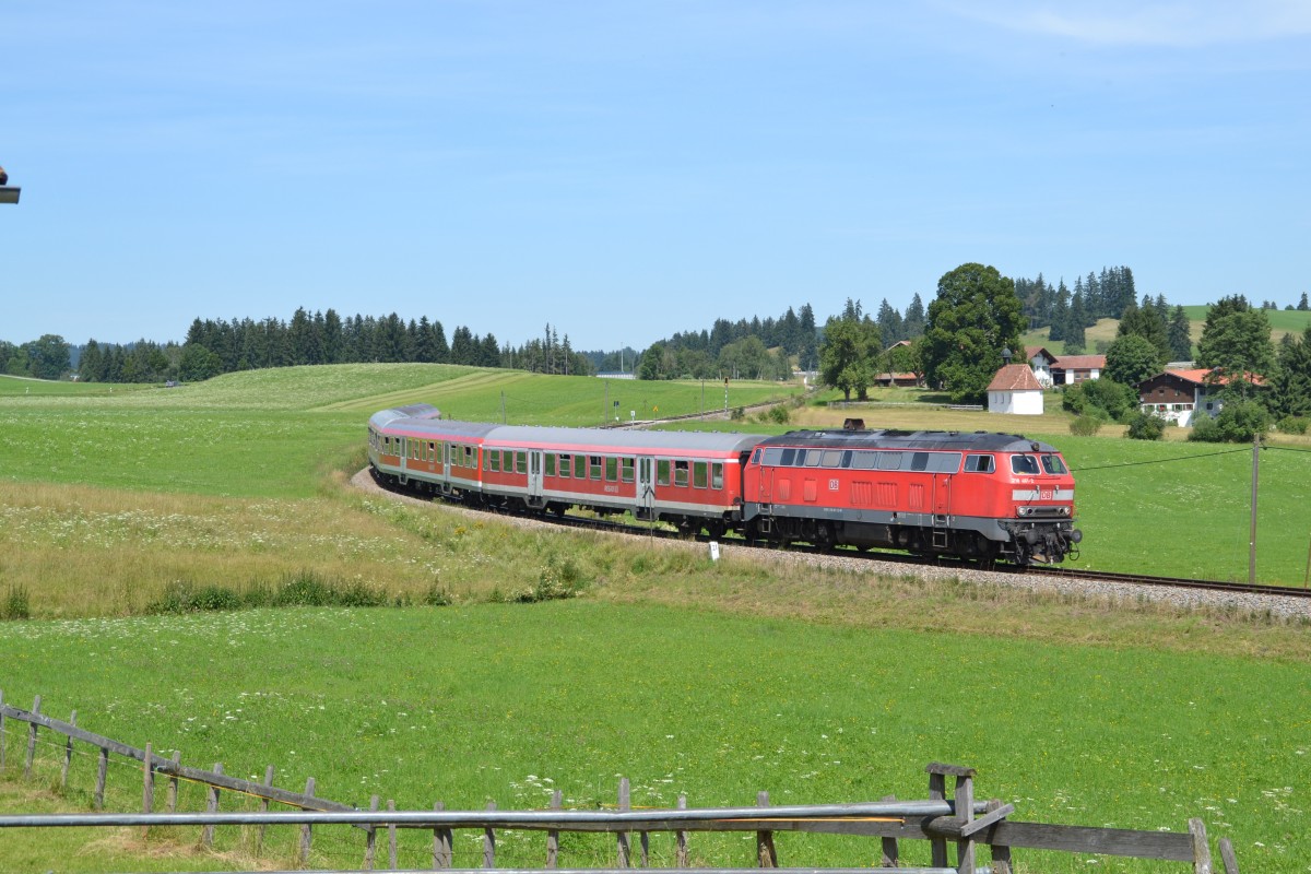 218 457 mit RE 57506 nach Füssen bei Seeg.  18.07.2014