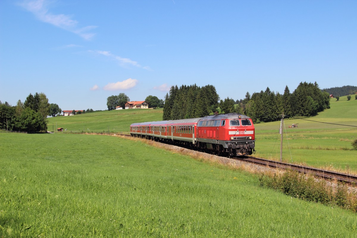 218 490-1 mit dem RE 57506 (München Hbf - Füssen) bei Weizern-Hopferau am 16.08.13