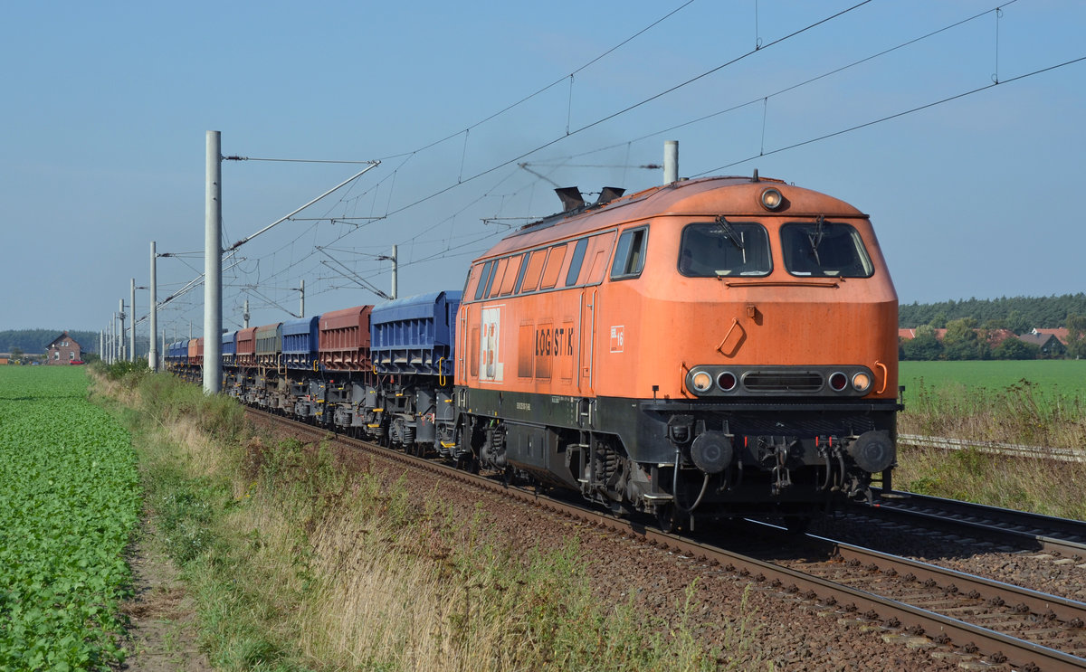 225 100 der BBL schleppte am 29.09.17 einen Ganzzug Seitenkipper durch Rodleben Richtung Roßlau.