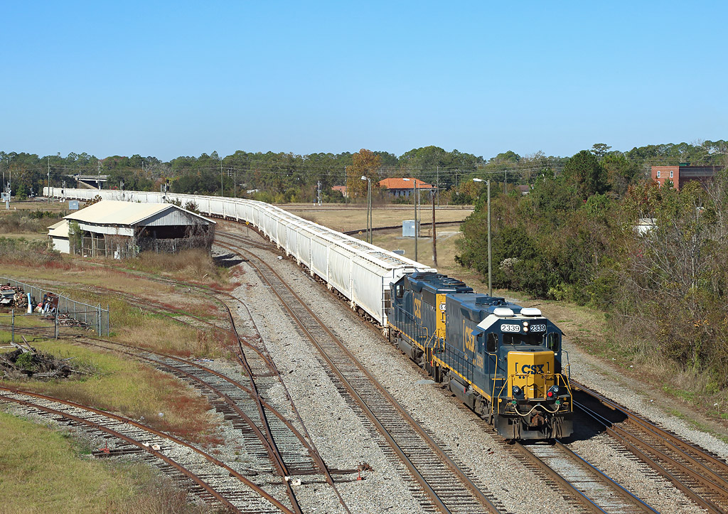2339 & 6455 cross the interlocking at Waycross with a train of hopper wagons, 24 Nov 2017.


2339 is a former GP40 but has been converted to a slug/running mate. The engine has been removed (replaced by added weight), it's traction motors being powered from a 'mother' loco via electrical cables...