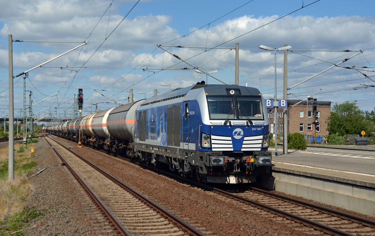 247 907 der Infra Leuna führte am 05.08.18 den sonntäglichen Ammoniakzug von Wittenberg-Piesteritz nach Großkorbetha. Hier führt sie ihren Zug durch Bitterfeld Richtung Leipzig.