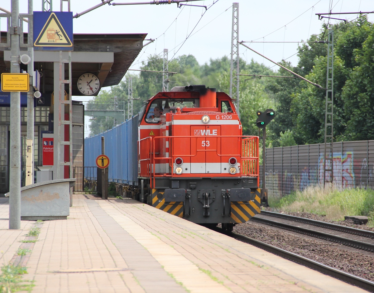 275 505-6 (WLE 53) mit Containerwagen aus Richtung Seelze kommend. Aufgenommen am 10.07.2013 in Dedensen-Gümmer.