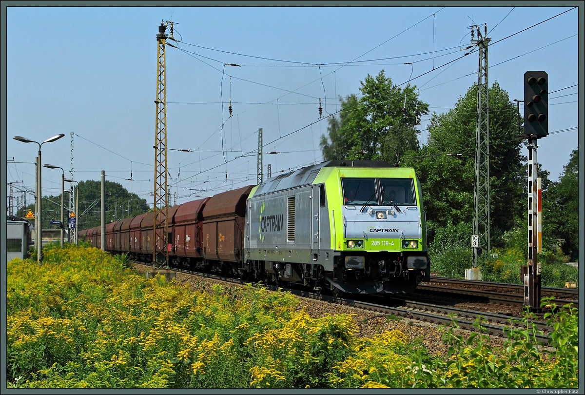 285 119-4 von Captrain durchfährt am 22.08.2015 den Bahnhof Leipzig-Thekla.