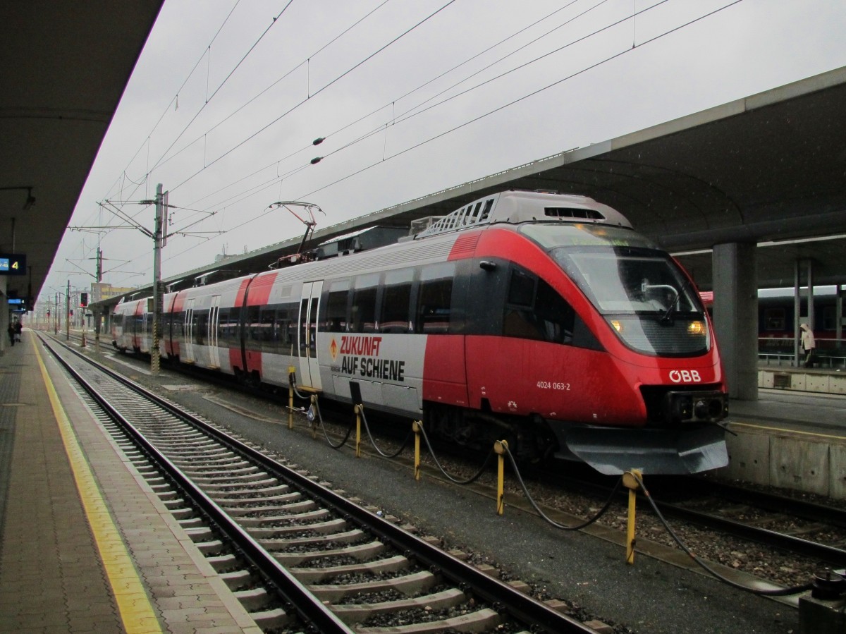 3.5.2014 17:18 ÖBB 4024 063-2 als REX nach Passau Hbf im Startbahnhof Linz Hbf.
