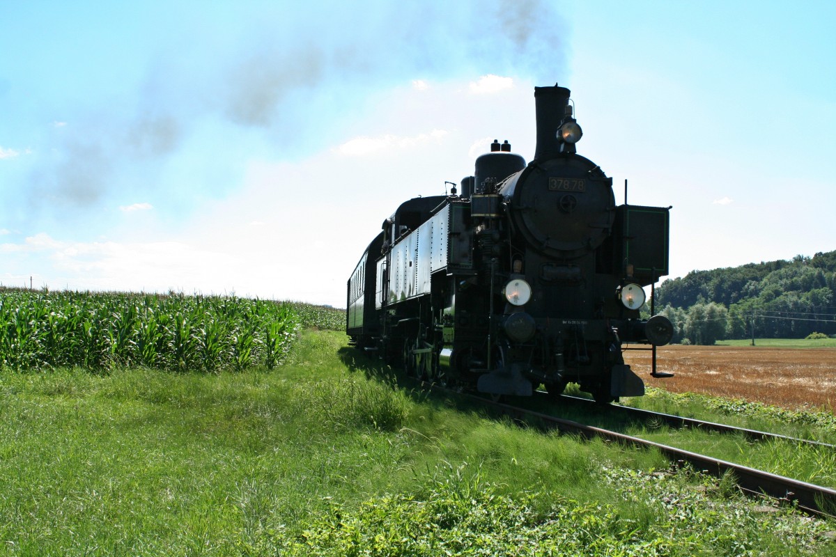 378.78 mit dem Pz4 am Nachmittag des 11.08.13 bei der Einfahrt in den Bahnhof Wollbach.