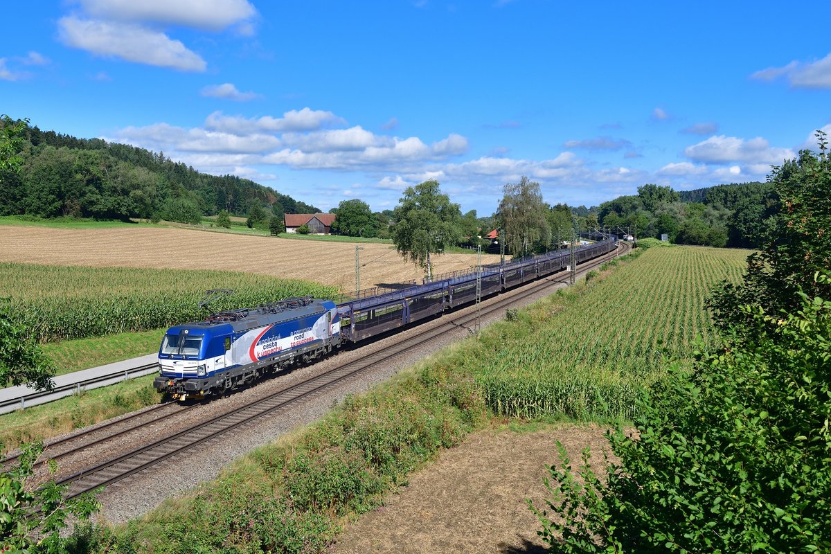 383 207 mit einem leeren Autozug am 19.08.2020 bei Einöd.