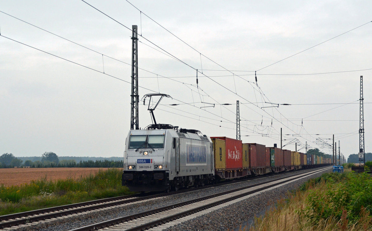 386 020 führte am 17.07.16 einen Containerzug durch Saxdorf Richtung Dresden.