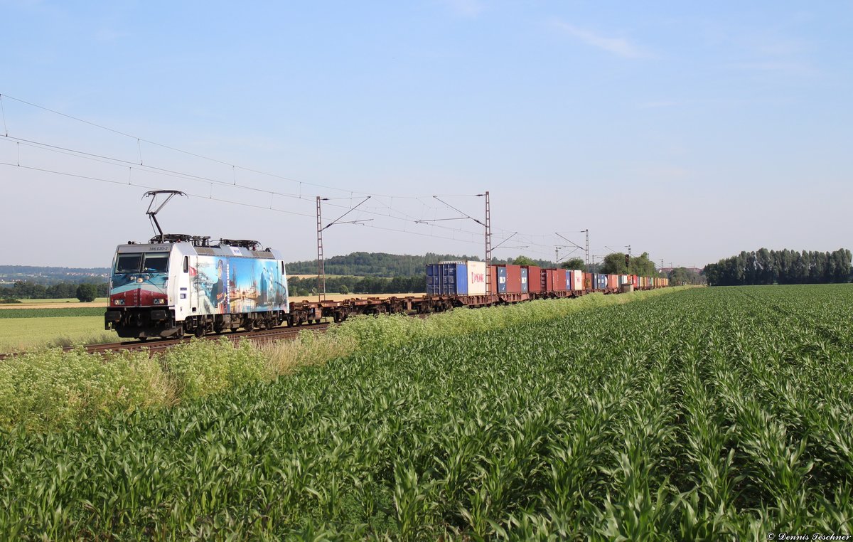 386 020 Metrans mit einem Containerzug bei Niedernjesa am 25.06.2019