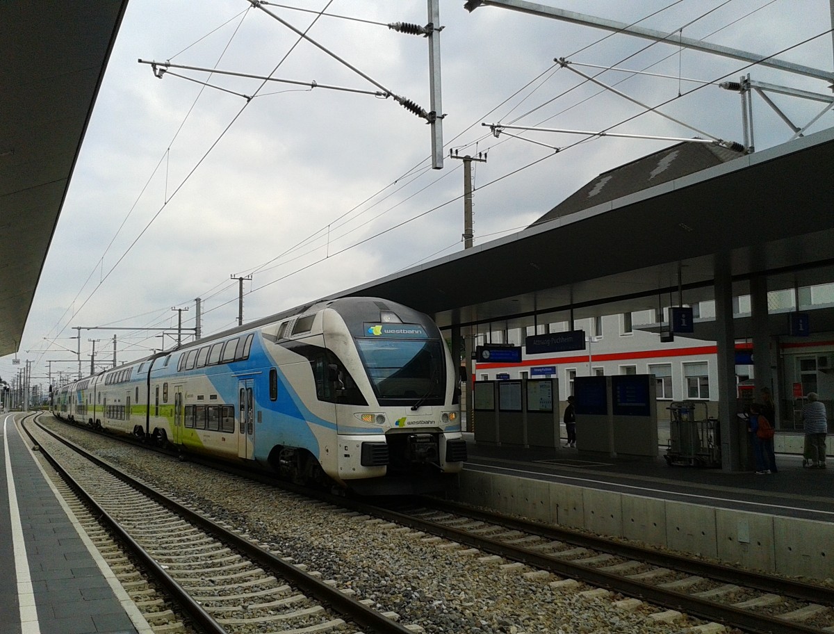 4010 007-1 als west 908 (Wien Westbahnhof - Salzburg Hbf) am 18.8.2015 bei der Einfahrt in den Bahnhof Attnang-Puchheim.