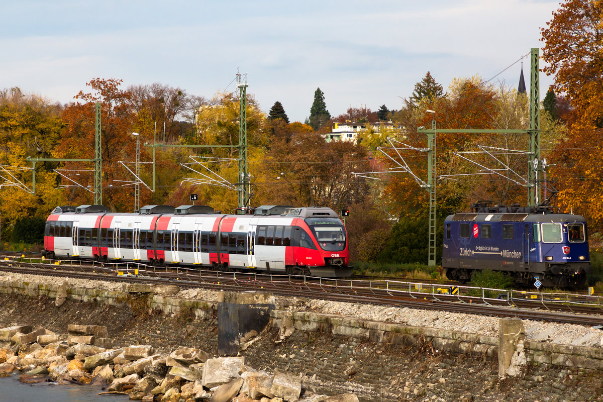 4024 054-1 und 421 392 auf dem Bahndamm Lindau. 30.10.20