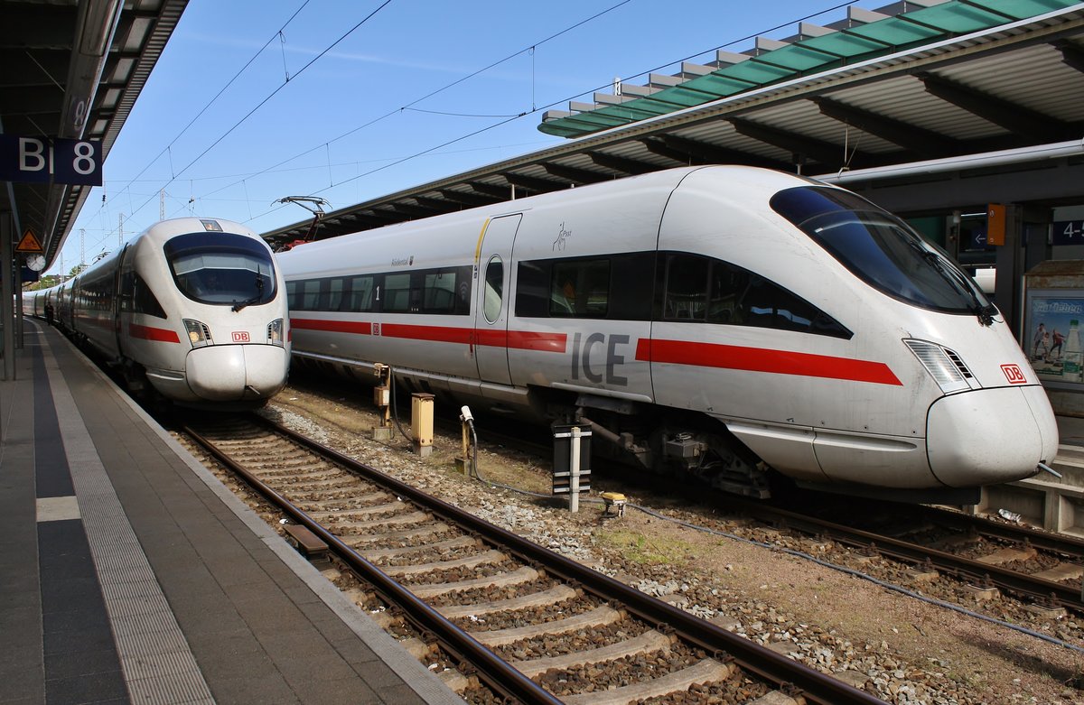 411 528-3  Reutlingen  trifft am 11.05.2019 als ICE1676 von Hannover Hauptbahnhof nach Stralsund Hauptbahnhof im Rostocker Hauptbahnhof auf 411 064-9  Rödental  als ICE1531 von Eisenach nach Warnemünde.