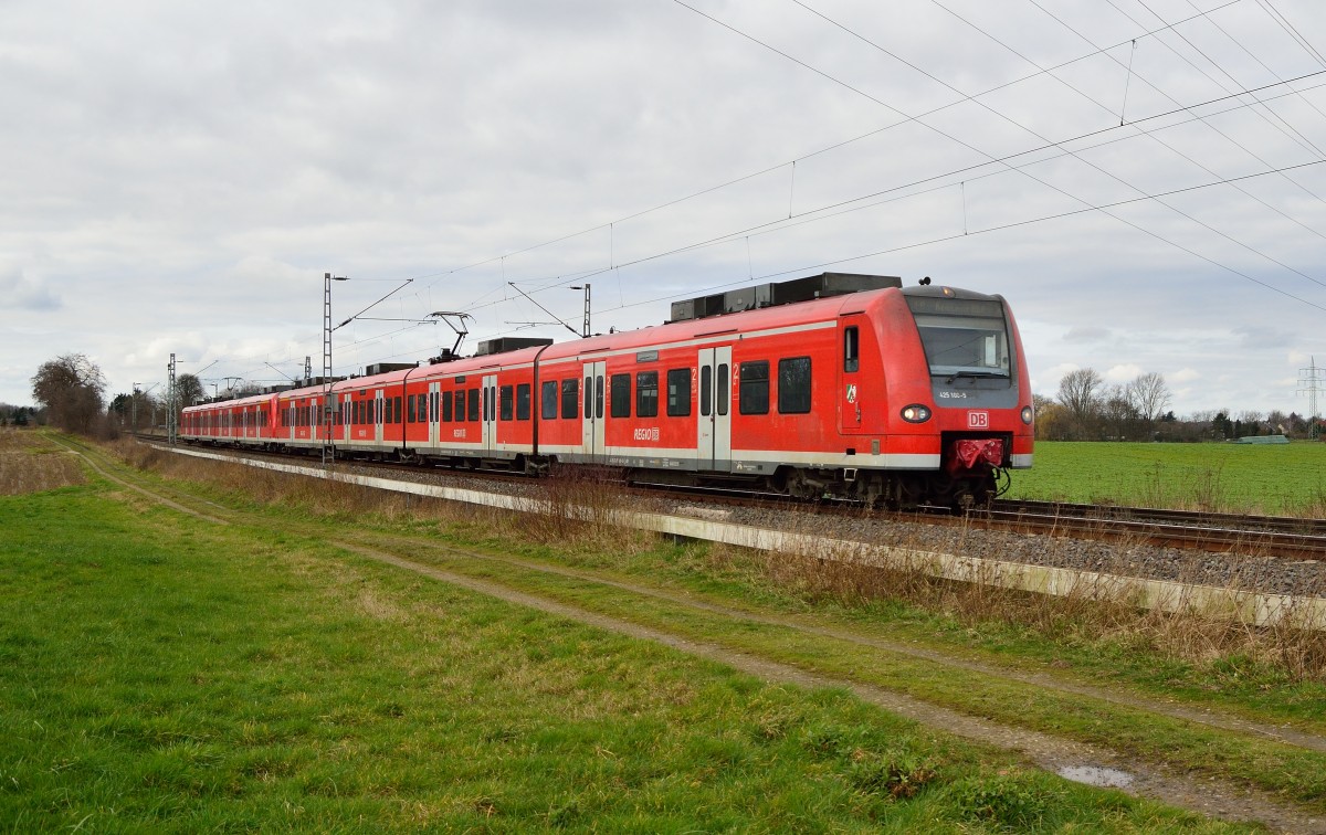 425 110-5 als RE8 nach Koblenz zwischen Gubberath und Noithausen. 23.2.2014