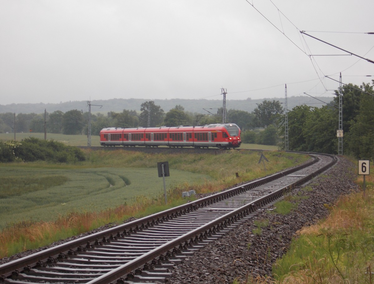 429 028 auf dem Weg nach Sassnitz,am 22.Juni 2015,zwischen Borchtitz und Sagard.