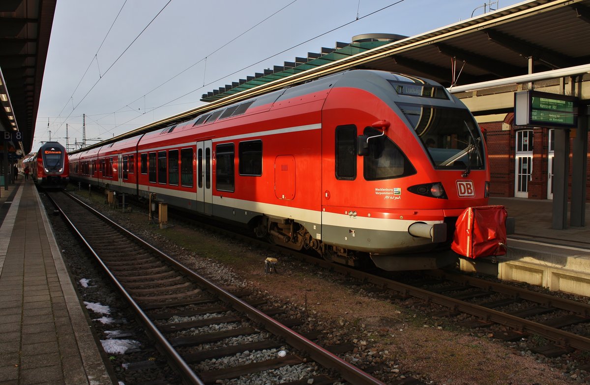 429 030-0 steht am 18.02.2021 als RB17 (RB13169) von Rostock Hauptbahnhof nach Ludwigslust im Startbahnhof bereit. 
