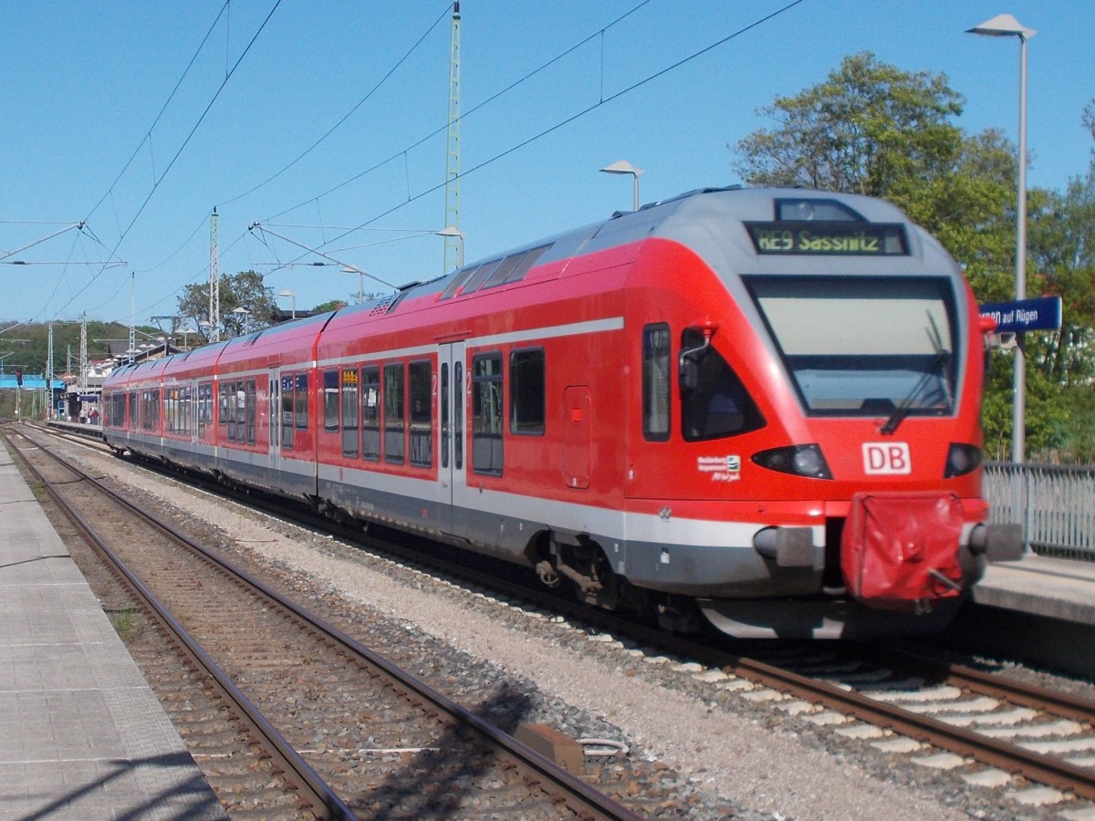 429 030,als RE 13013 Rostock-Sassnitz,am 14.Mai 2015,bei der Einfahrt in Bergen/Rügen.