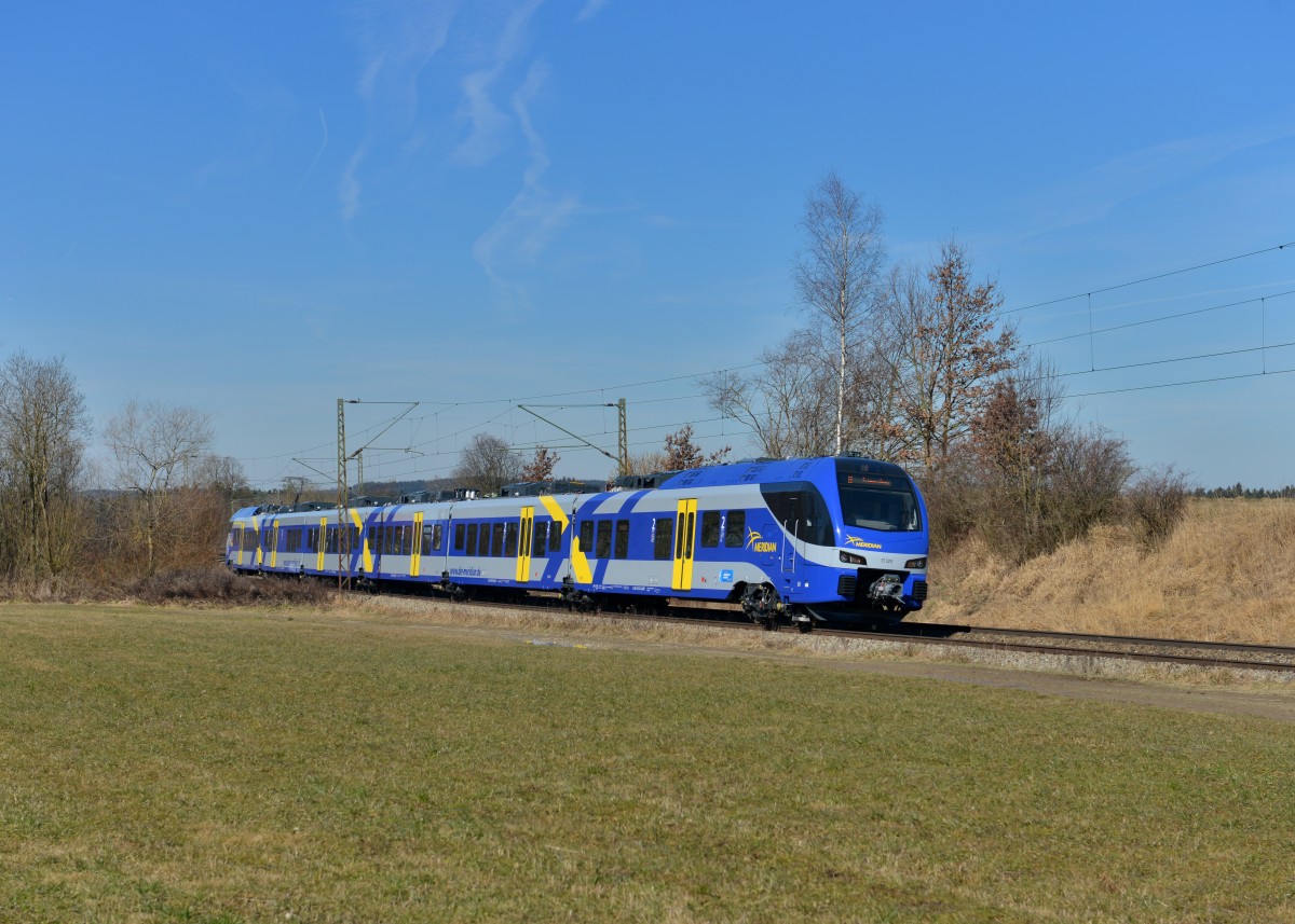 430 025 als M nach Kufstein am 25.02.2014 bei Ostermünchen. 