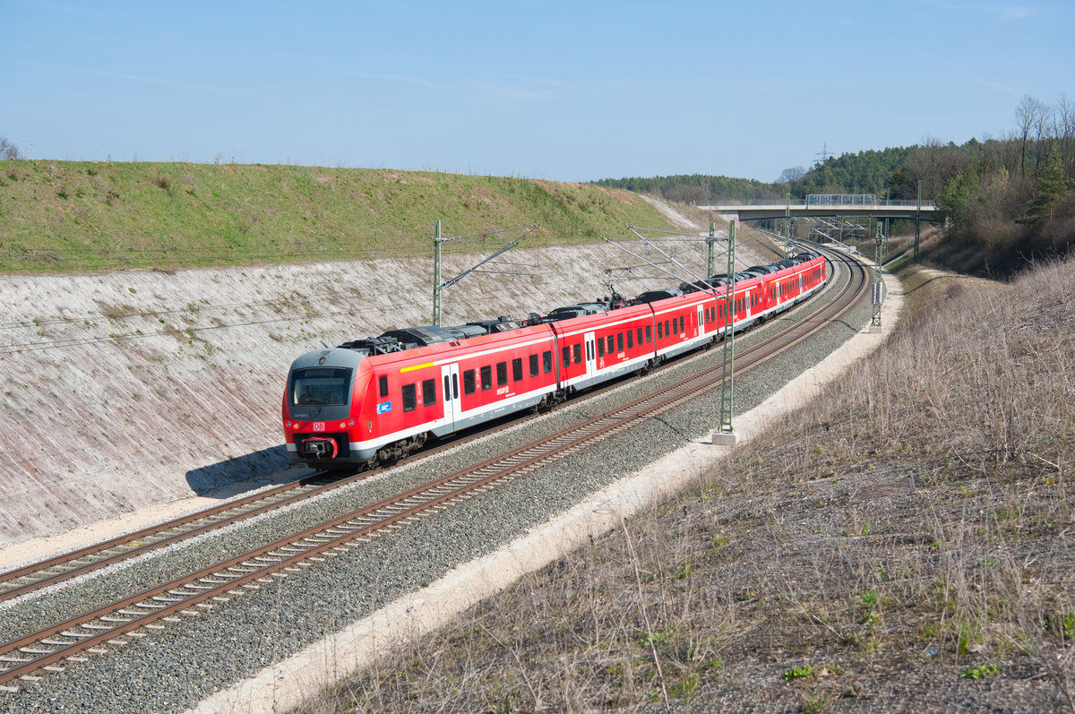 440 540 als RE 58218 von Nürnberg Hbf nach Würzburg Hbf bei Emskirchen, 30.03.2019