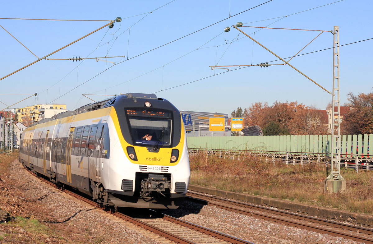 442 309 als RB 17b Heidelberg-Stuttgart am 26.11.2020 in Stuttgart-Zuffenhausen. Grüße gehen auch an die TFin.  