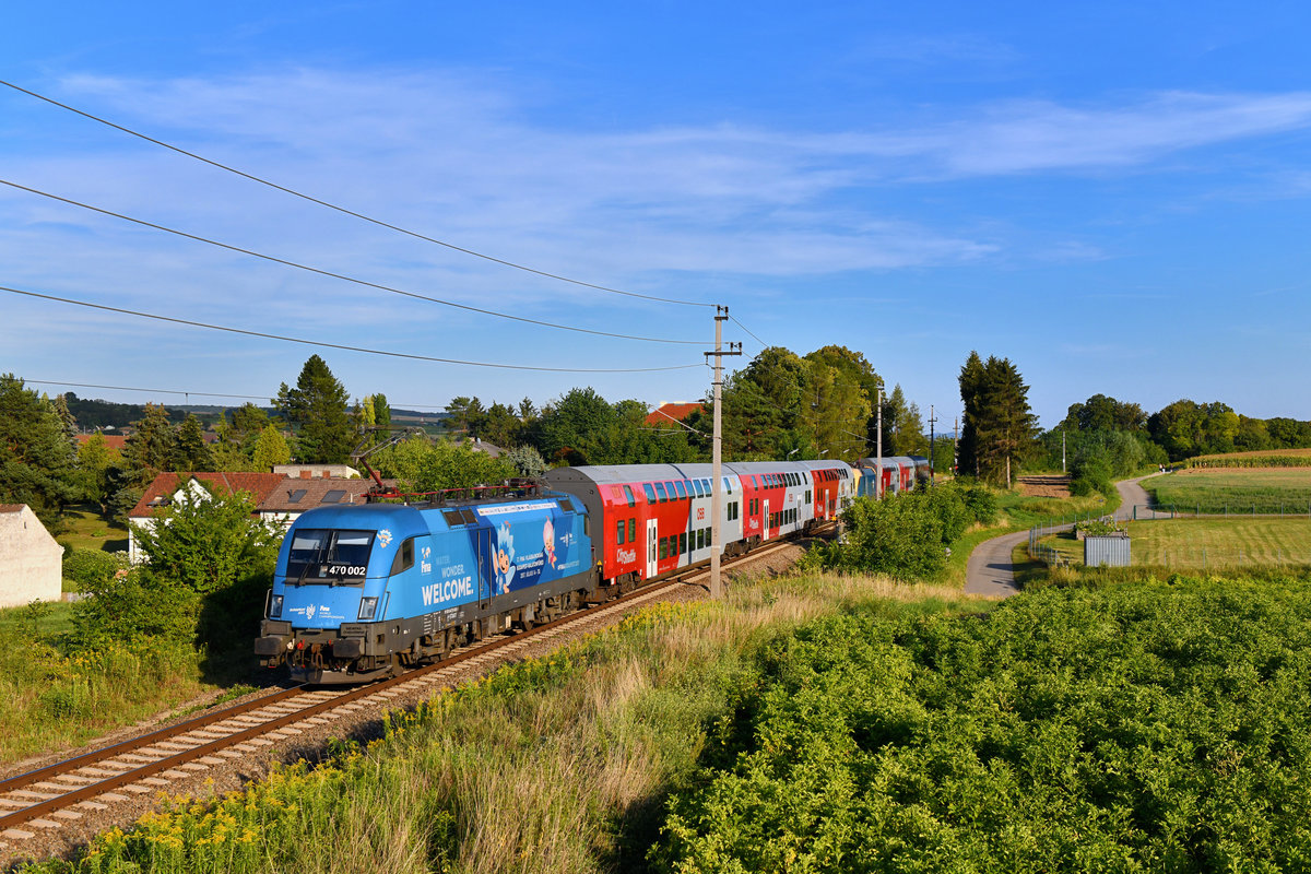 470 002 mit einem REX am 12.08.2018 bei Glaubendorf. 