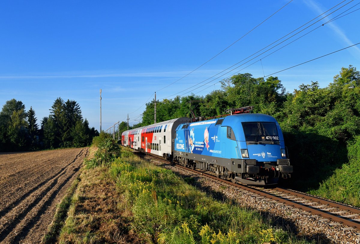 470 002 mit einem REX am 12.08.2018 bei Großwiesendorf. 