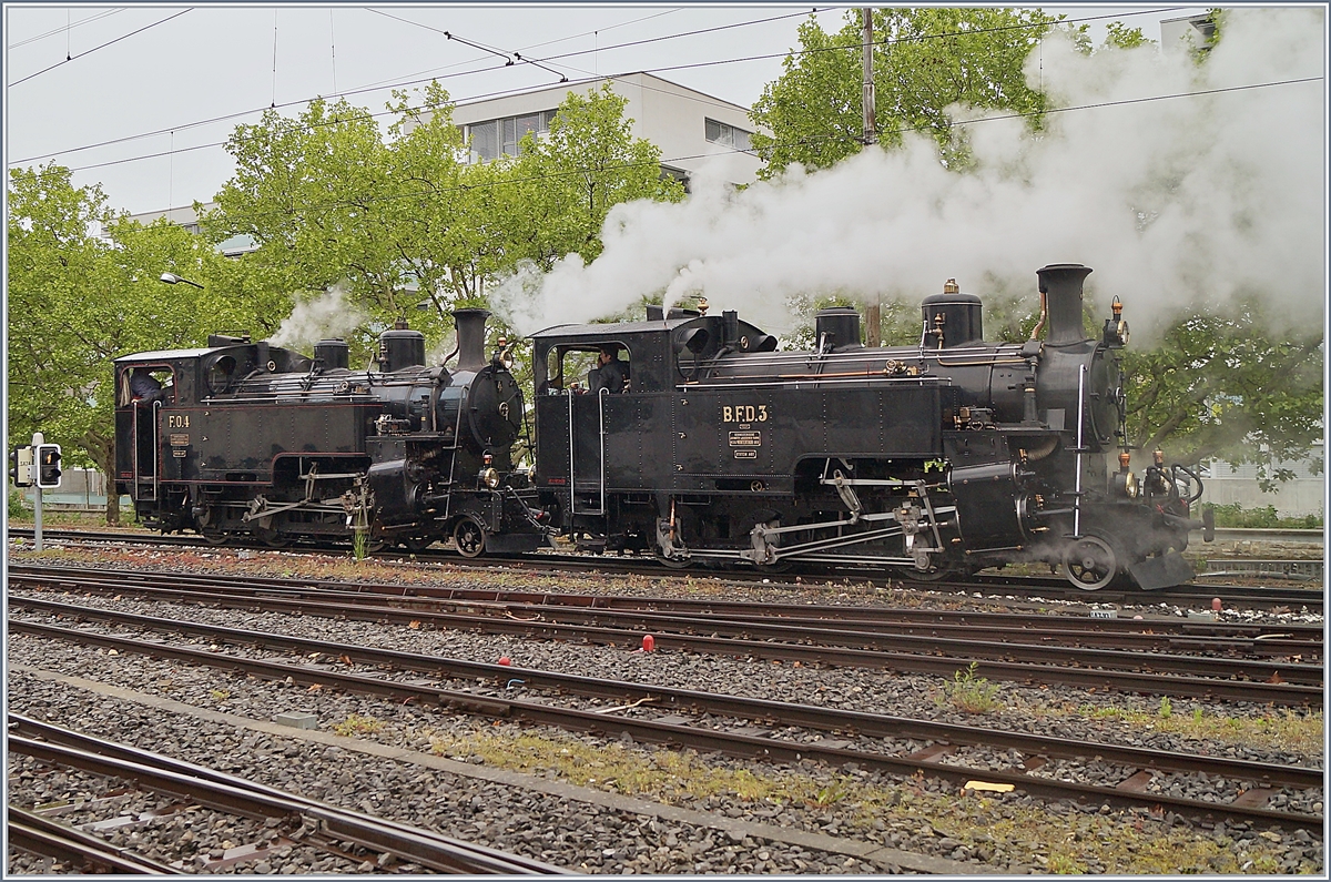 50 Jahre Blonay - Chamby; Mega Steam Festival: Die FO HG 3/4 N° 4 der DFB und die BFD HG 3/4 N° 3 der Blonay-Chamby Bahn dampfen in Vevey zu ihrem Zug um in anschliessend nach Chaulin zu bringen.

13. Mai 2018