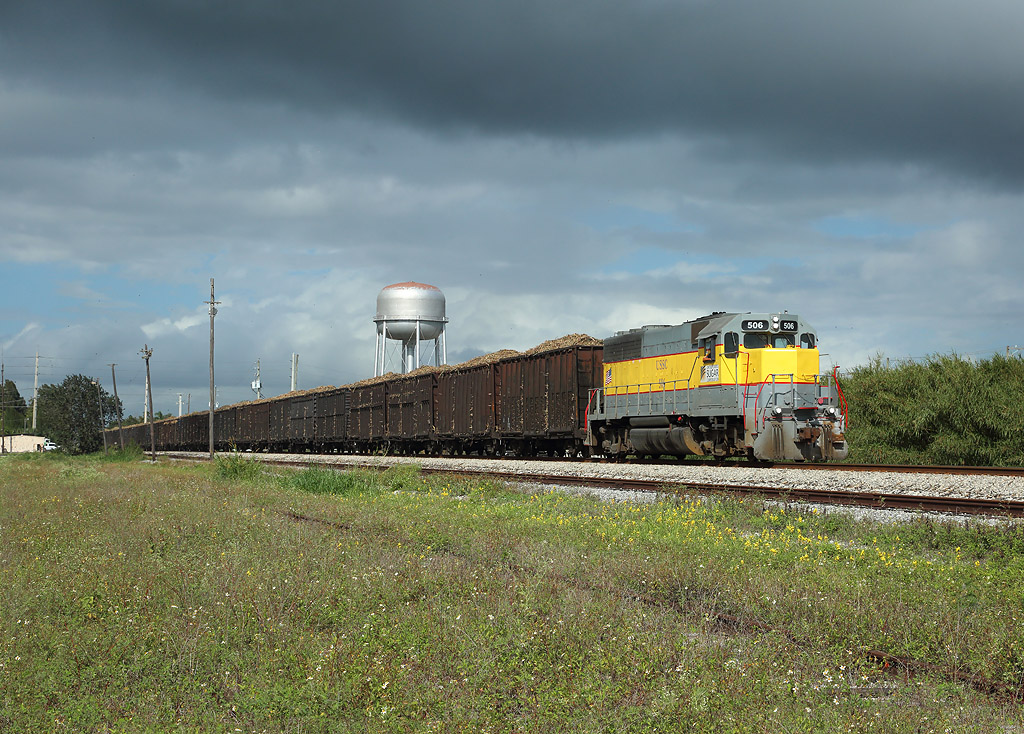 506 passes Belle Glade whilst hauling BT1, loaded sugarcane from Bryant to Clewiston, 16 Feb 2020