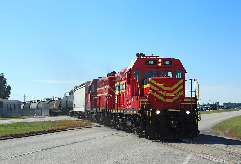 55 & 57 push a mixed freight train in to the yard at Bartow Airport on Florida Midland`s Winter Haven line, 21 Nov 2018