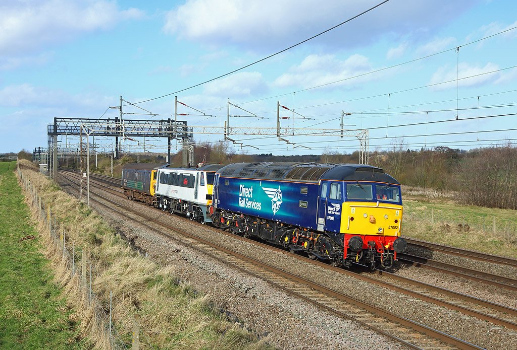 57302 approaches Heamies Farm whilst hauling 90002 and a DBSO from Crewe Electric TMD to Norwich Crown Point,  15 Feb 2018