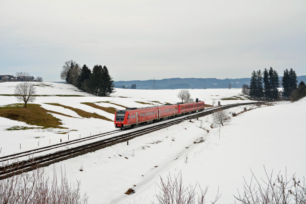 612 558 mit RE 3162 von München nach Kempten HBF.Aufgenommen bei Görwangs im Allgäu am 21.2.2015.