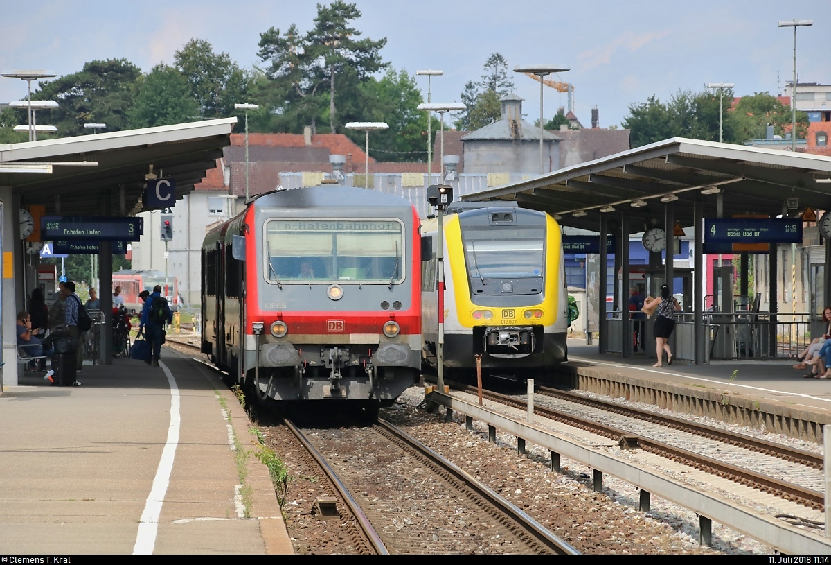 629 005 der DB ZugBus Regionalverkehr Alb-Bodensee GmbH (RAB) (DB Regio Baden-Württemberg) als RB 22710 von Lindau Hbf nach Friedrichshafen Hafen trifft auf 612 567 (Bombardier RegioSwinger) als IRE 3044 von Ulm Hbf nach Basel Bad Bf im Bahnhof Friedrichshafen Stadt.
[11.7.2018 | 11:14 Uhr]