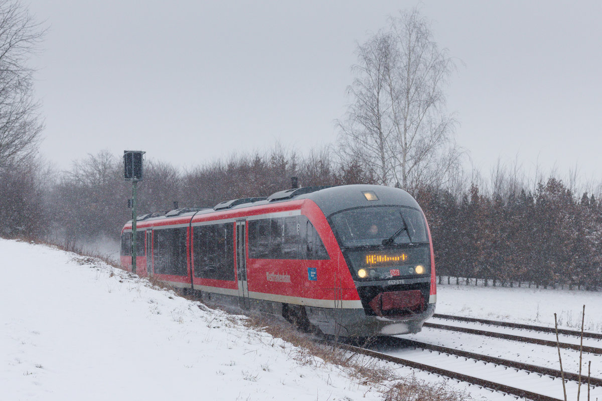 642 676 als RE Hessental-Heilbronn am 10.02.2021 bei Öhringen-Cappel. 