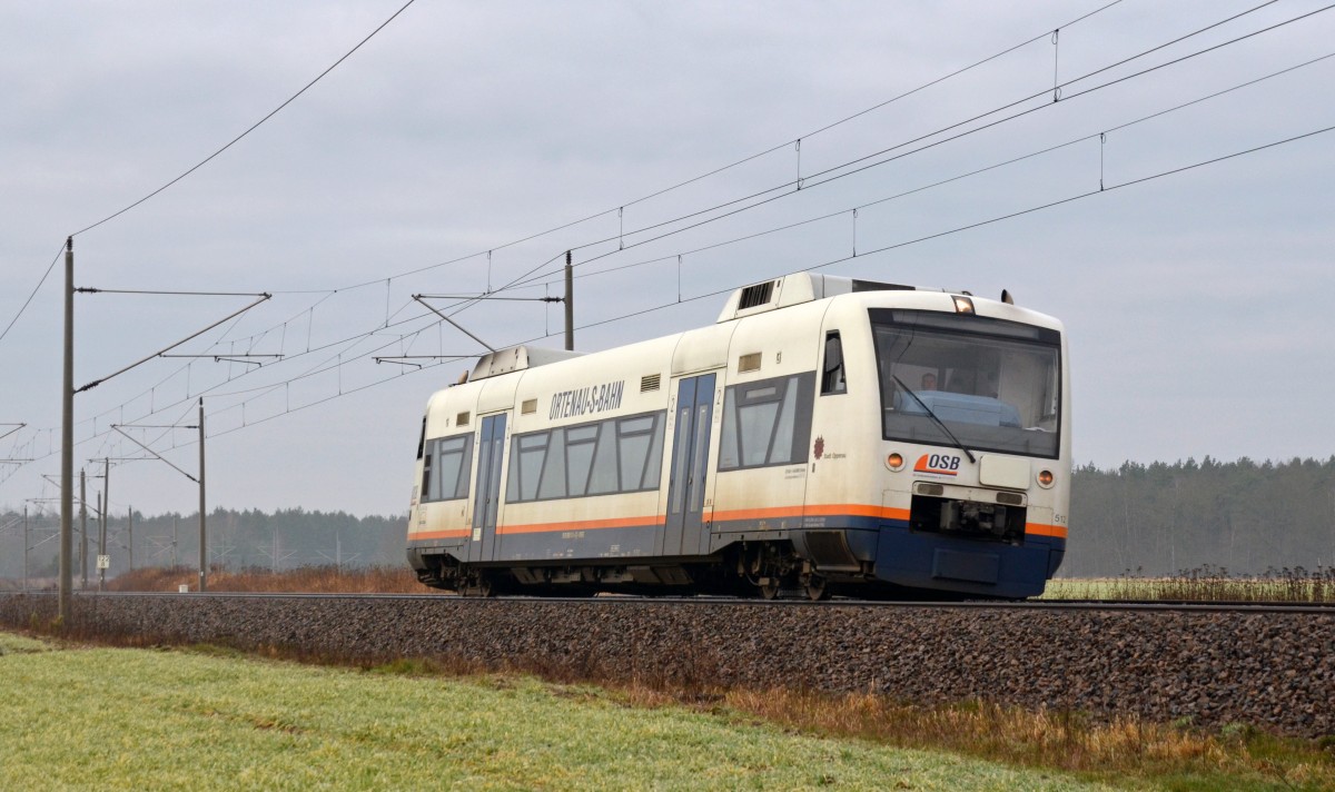 650 574 der SWEG fuhr am 18.01.15 durch Burgkemnitz Richtung Wittenberg. Es ist anzunehmen das der Regioshuttle nach Berlin zum Hersteller Stadler unterwegs war.