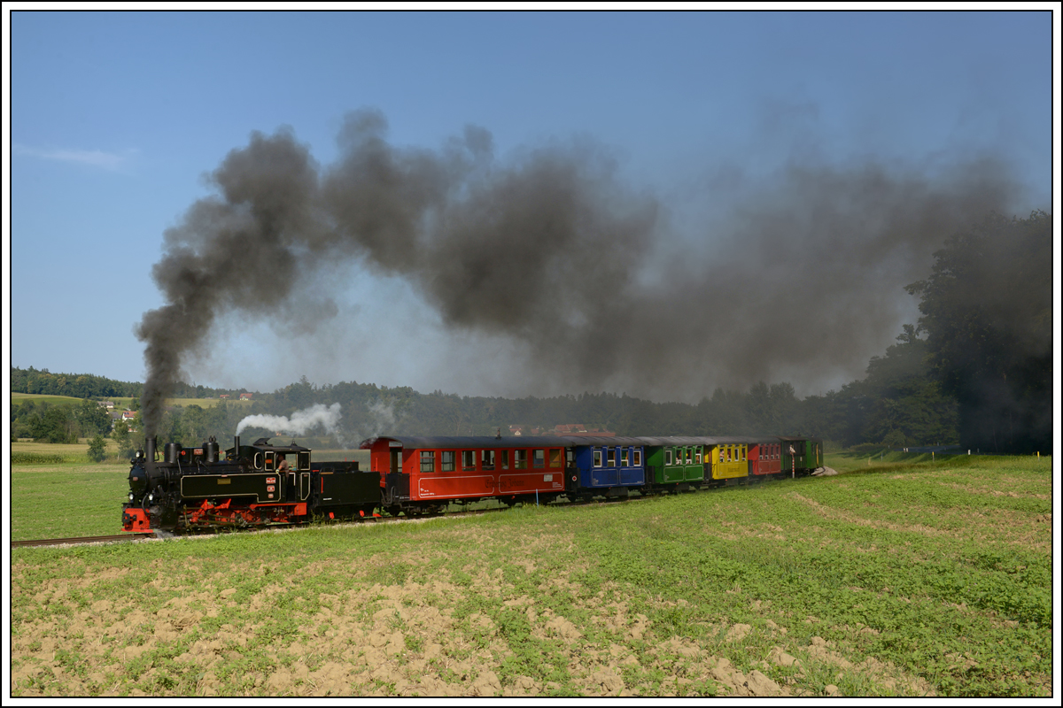 764-411R der Stainzer Bahn am 12.8.18 auf der Fahrt von Preding nach Stainz zwischen Neudorf/Stainztal und der Haltestelle Ölmühle Herbersdorf aufgenommen. 