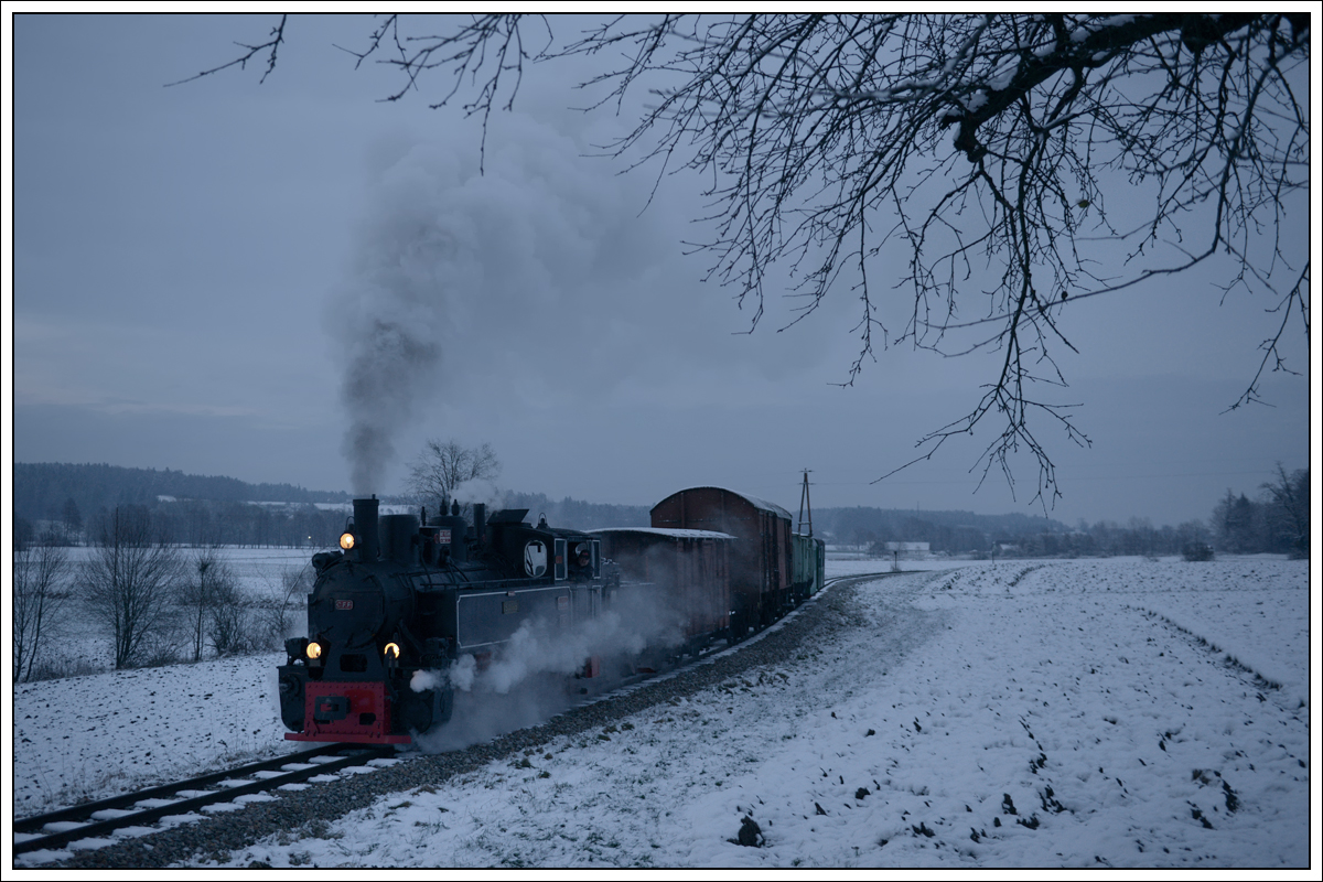 764-411R der Stainzer Bahn am 16.12.2018 kurz vor der Haltestelle Ölmühle Herbersdorf.