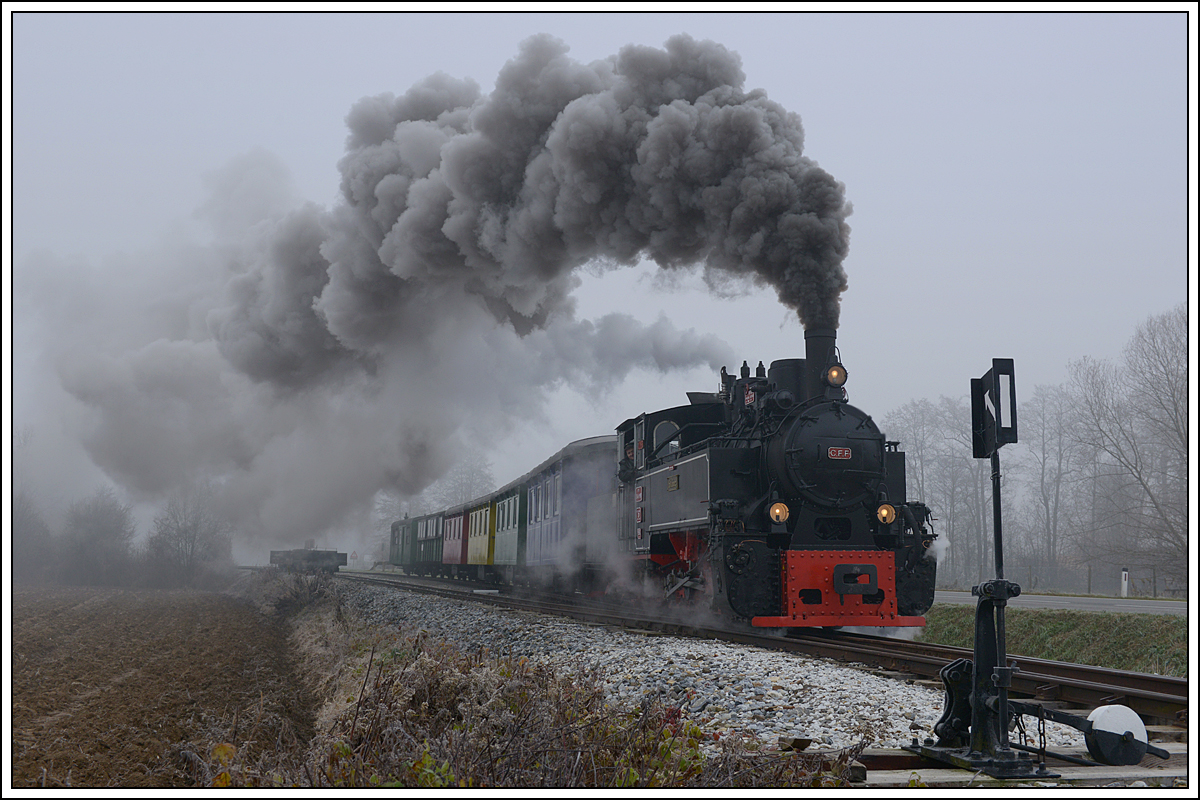 764-411R der Stainzer Bahn am 2.12.2018 kurz nach Preding in Wohlsdorf.