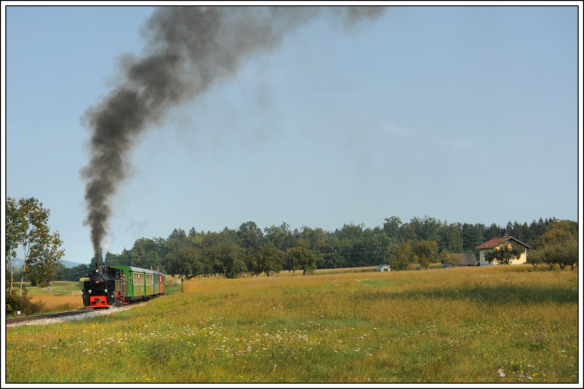 764-411R der Stainzer Bahn am 29.8.18 auf der Fahrt von Preding nach Stainz kurz vor der Haltestelle Ölmühle Herbersdorf. (70 mm Version)