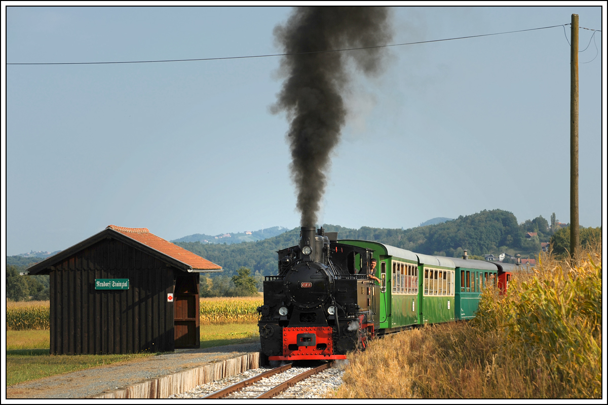 764-411R der Stainzer Bahn am 29.8.18 auf der Fahrt von Preding nach Stainz bei der Durchfahrt in Neudorf/Stainztal.