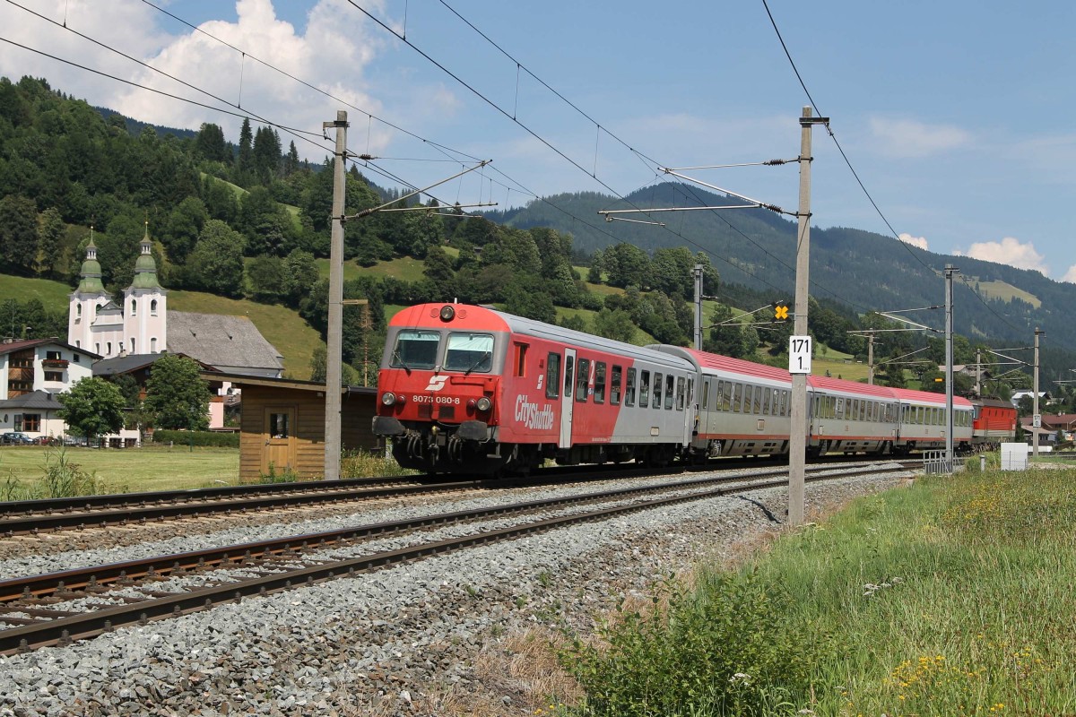 80-73 080-8 und 1144 090 mit OIC 514 Bischofshofen-Innsbruck Hauptbahnhof bei Brixen im Thale am 26-7-2013.