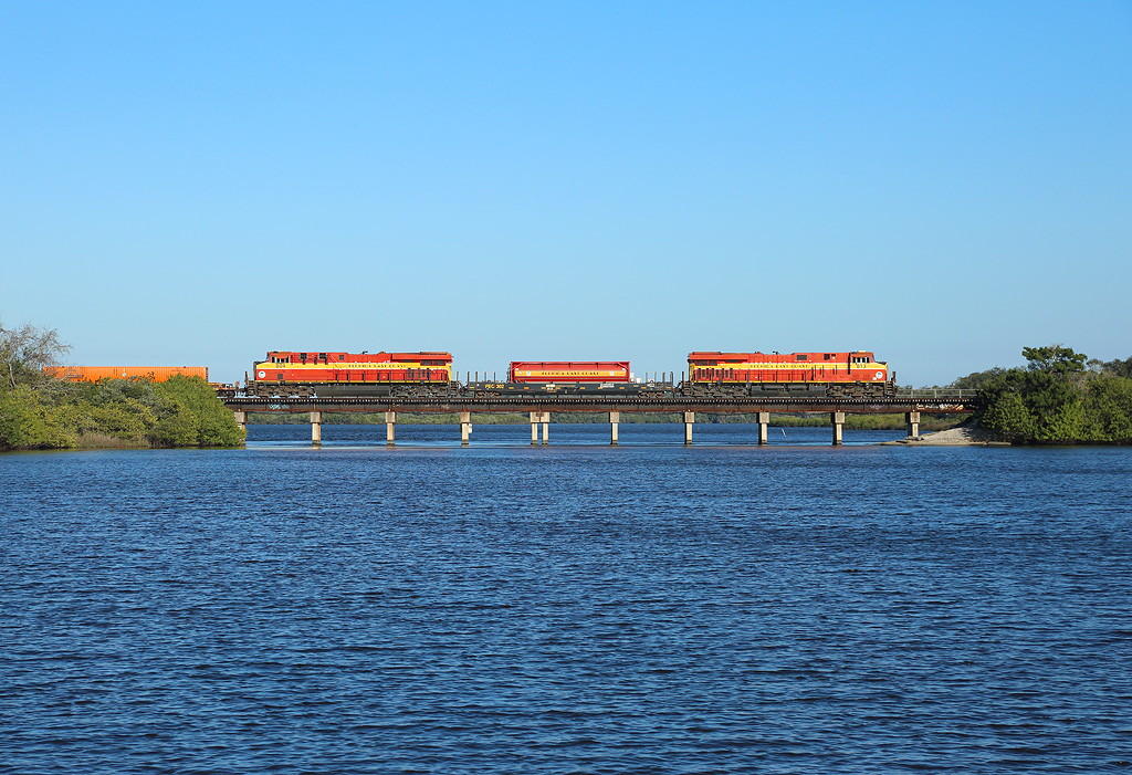 813 & 802 cross Spruce Creek whilst hauling train 105 to Miami, 2 March 2022