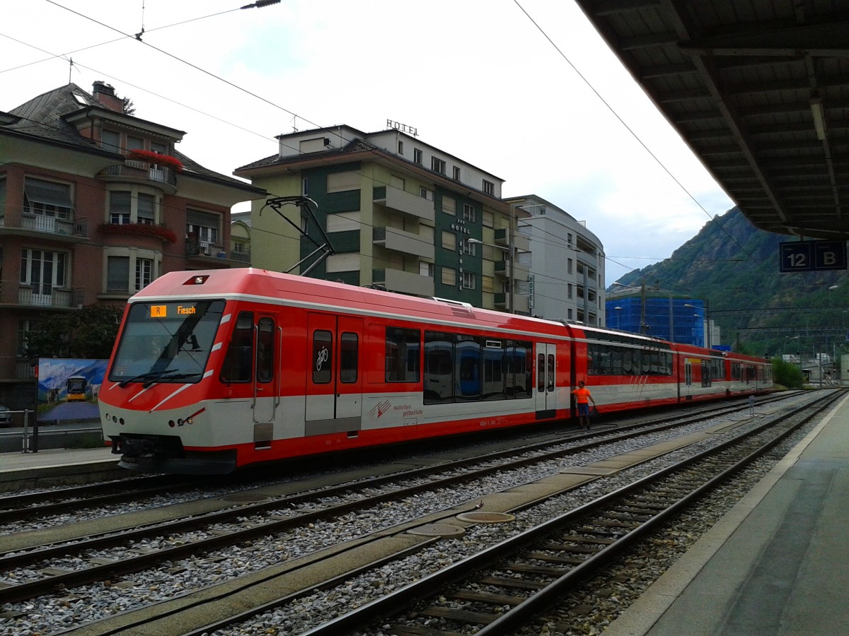 ABDeh 4/8 2025 als R 348 (Zermatt - Brig Bahnhofplatz - Fiesch) am 22.7.2015 biem Halt in Brig Bahnhofplatz.