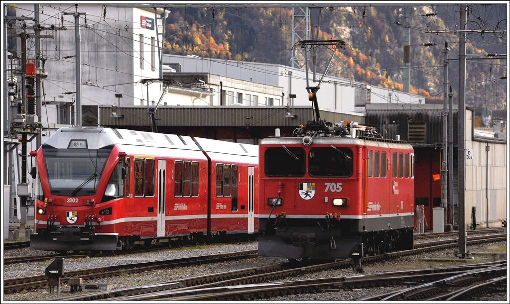 ABe 4/16 3102 und Ge 6/6 II 705 in Landquart. (11.11.2014)