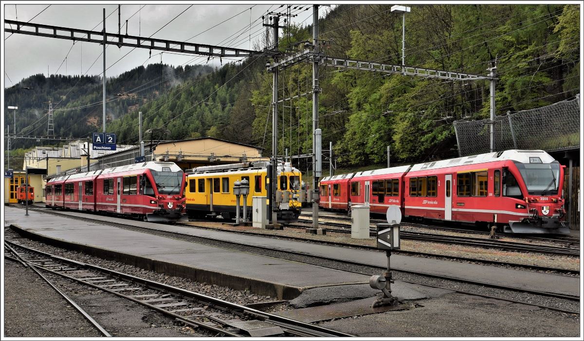 ABe 8/12 3507, Xe 23201 und ABe 8/12 3508 in Poschiavo an diesem Morgen nur im Schienenersatzverkehr mit dem Postauto über den Berninapass erreichbar. (27.04.2017)