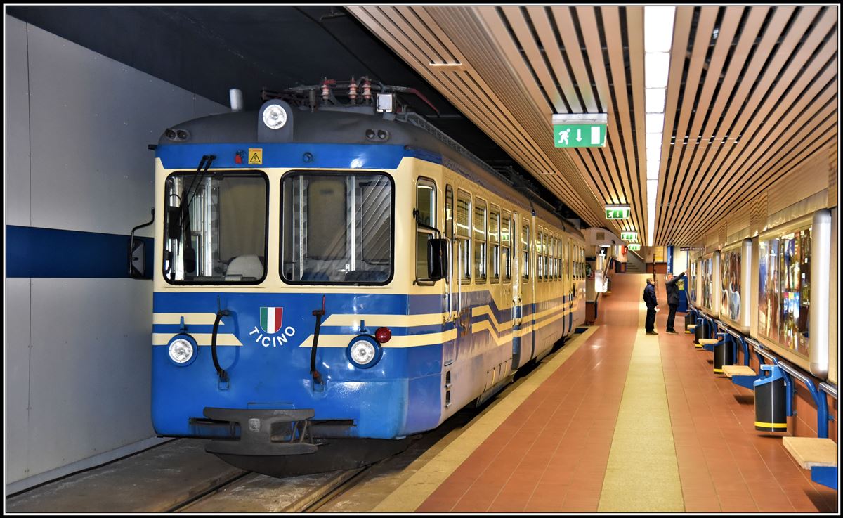 ABe 8/8 22  Ticino  fährt ab der unterirdischen Station Domodossola um 13.53 als Schülerzug Reg763 bis nach Re. (10.04.2019)