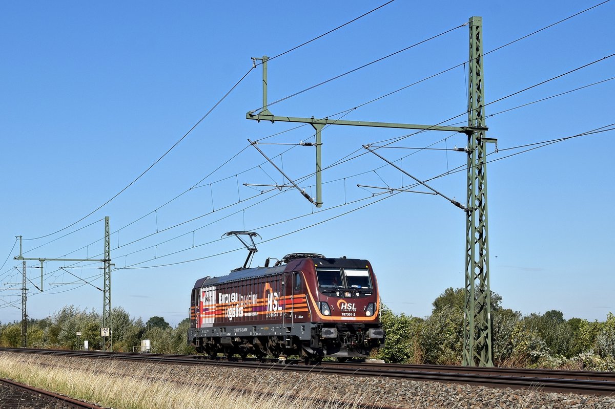 Akiem 187 501, vermietet an HSL Logistik,  Akiem - European Logistics Together - HSL  solo in Richtung Osnabrück (bei Diepholz, 27.09.18).